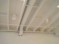 Exposed ceiling pipes